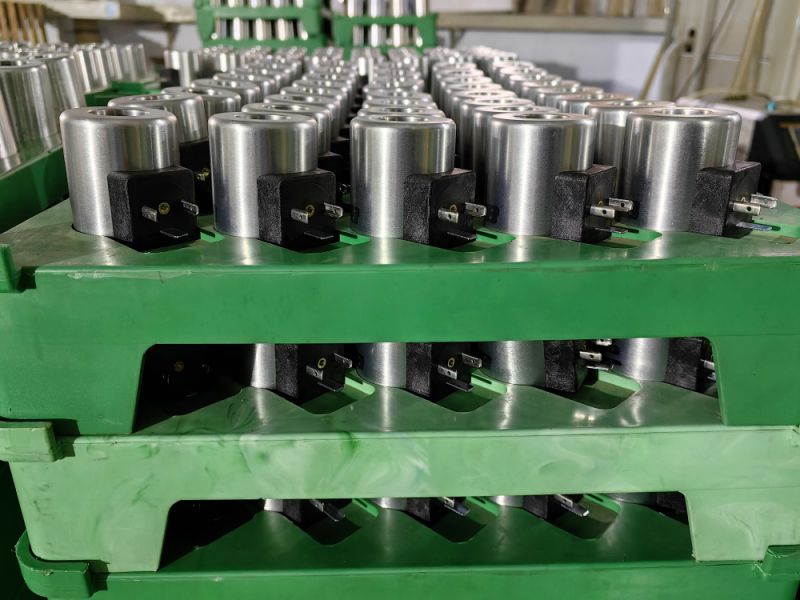 Injection molding of coils